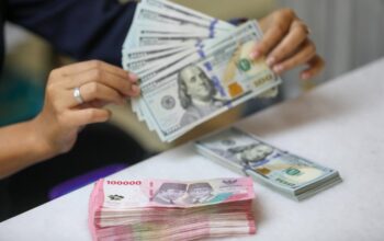 Rupiah Diproyeksi Menguat terhadap Dolar AS, Sentimen Global Jadi Pendorong
